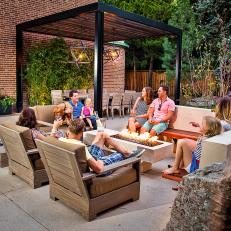 Family-friendly Outdoor Living Area with Seating and Fire Pit