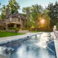 Brick Home with Backyard Lap Pool and Water Features 