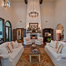 Neutral, Spanish Living Room with Tall Stone Fireplace
