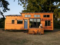 Living tiny doesn't mean you have to rough it. See how tiny home designers Tyson and Michelle Speiss pack luxurious amenities into houses measuring 330 square feet or less.
