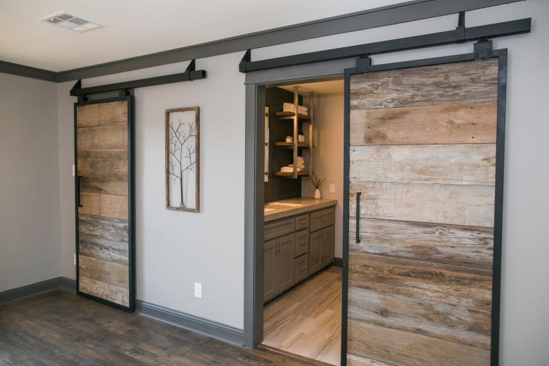 The sliding barn doors in the master bedroom of the newly renovated Ridley home, as seen on Fixer Upper. (After #1)