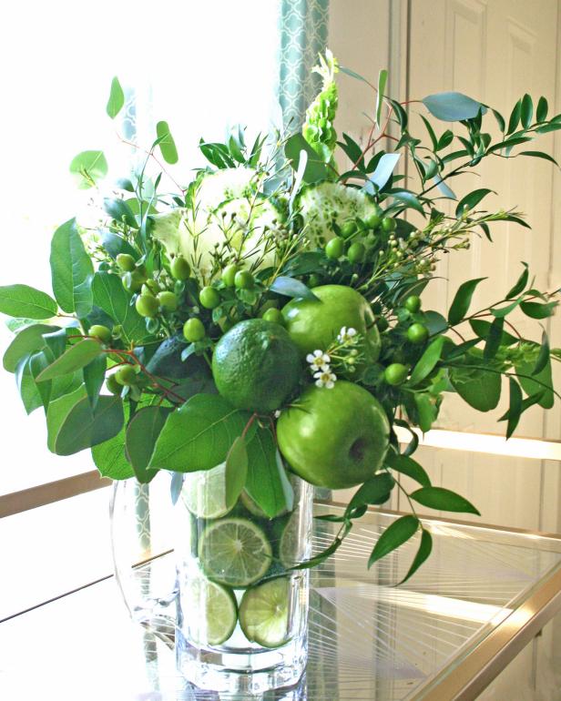 Flower Arrangement Made From Apples, Limes, Kale and Green Flowers