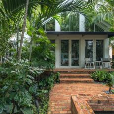 Brick Walkways and Patio With Tropical Plants
