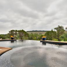 Contemporary Infinity Pool with Hot Tub