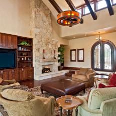 Tuscan-Inspired Living Room with Soaring Ceiling