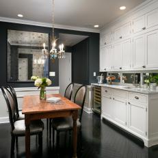 Black and White Cottage Kitchen With Chandelier