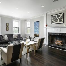 Traditional Living Room With Chic Black Fireplace