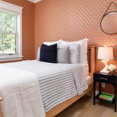 Orange Country Guest Bedroom With Wood Bed