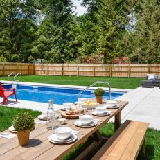 Backyard With Pool and Picnic Table