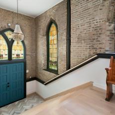 Urban Foyer With Stained Glass Windows