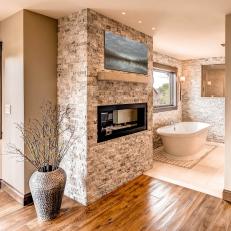 Contemporary Fireplace in Rustic Bathroom