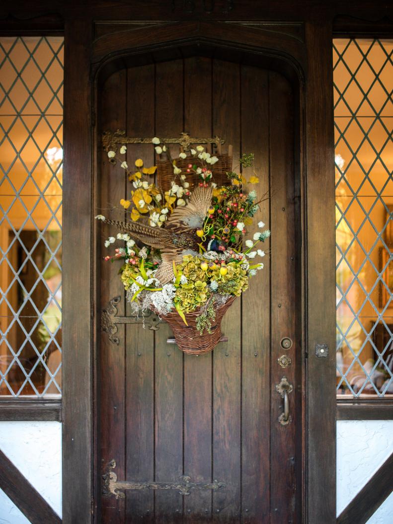 Tudor-style Front Door with Decorative Basket