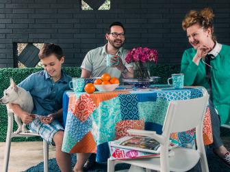 Vibrant colors, fun patterns and durable seating transform an unused outdoor space into the perfect spot for a young family to dine together al fresco. When decorating a family-friendly outdoor space, consider low-maintenance furnishings, soft underfoot surfaces and durable seating options.