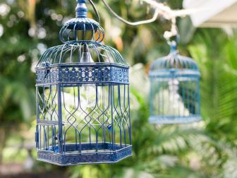 STATEMENT LIGHTINGHomeowners who use their outdoor living spaces after dark should consider adding statement lighting to add ambience and help spark conversation among guests. An easy, DIY lighting project for covered outdoor spaces is a grouping of spray-painted lanterns and/or birdcages retrofit with outdoor-rated pendant kits or LED lighting.