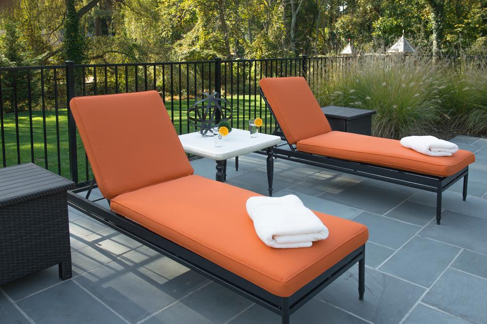 Pool Area With Orange Lounge Chairs Hgtv