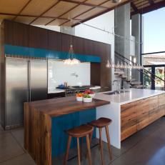 Neutral Midcentury Open Plan Kitchen With Blue Accents