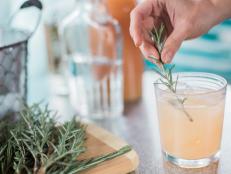 Garnish your Rosemary Greyhound Cocktail with rosemary and enjoy