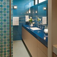 Contemporary Blue Bathroom With Blue Vanity Countertop