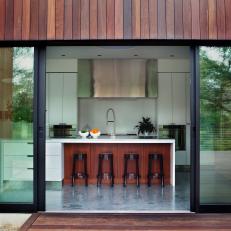 Modern Open-Air Kitchen With Exotic Wood Accents