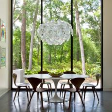 Midcentury Modern Dining Room With Eye-Catching Floral Chandelier