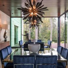 Midcentury Modern Dining Room With Starburst Chandeliers