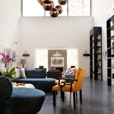 Colorful Sitting Room With Polished Concrete Floors 
