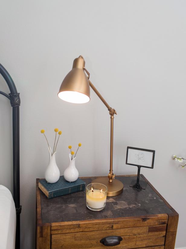 A close-up of the side table in the master bedroom of the newly renovated Eggers home, as seen on Fixer Upper. (after)