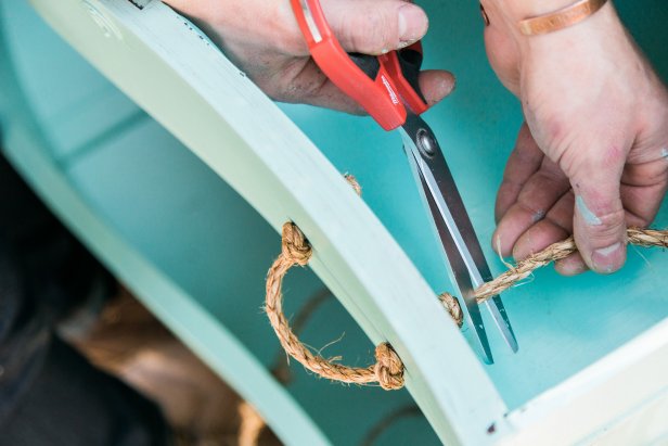 Before you kick that old dresser or vanity to the curb, consider upcycling it into a vibrant multifunctional piece of outdoor furniture with storage galore!