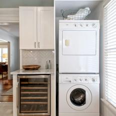 Modern Kitchen With Built-In Laundry Area