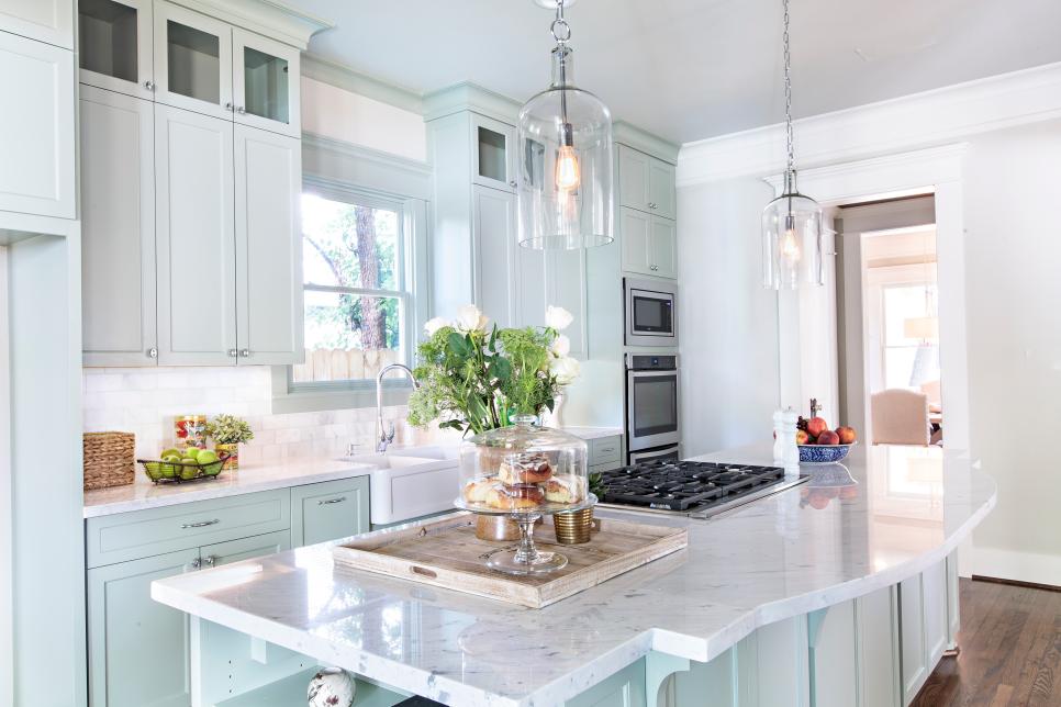 White Kitchen With Soft Mint-Colored Cabinetry