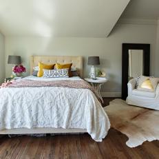 Layered Look, Small Pops of Color Create Inviting Bedroom