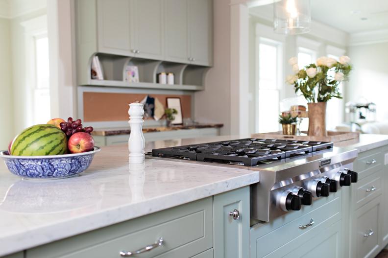 Mint-Green Kitchen Island With Marble Countertop