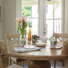 Bright Breakfast Nook With Weathered Wood French Country Dining Set