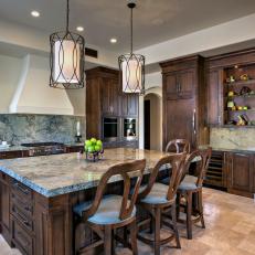 Spacious Mediterranean Eat-In Kitchen With Gray Marble Countertops