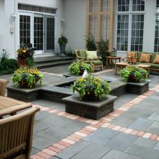Fountain and Patio With Planters