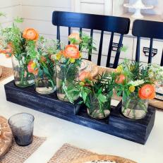 Country Floral Centerpiece With Painted Wood Base and Orange and Yellow Blooms in Glass Vases 