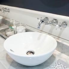 Contemporary White Vessel Sink Over White Marble Bathroom Countertop