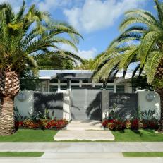 Large Palms In Front of Contemporary Style Grey and White Home