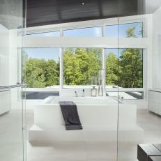 White Modern Master Bathroom With Bench