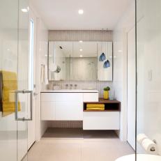 White Modern Bathroom With Yellow Towels