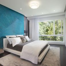 Modern Small Bedroom With Blue Accent Wall