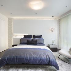 White Modern Bedroom With Blue Linen
