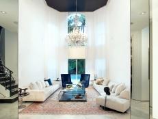 White Living Room With High Ceiling