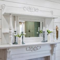 White Wooden Fireplace Mantel Surrounded by Shiplap Accent Wall