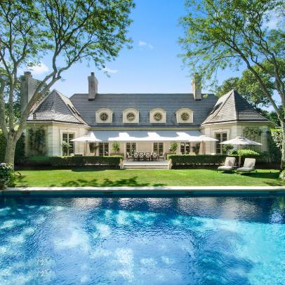 European-Inspired Home on Tree-Lined Driveway
