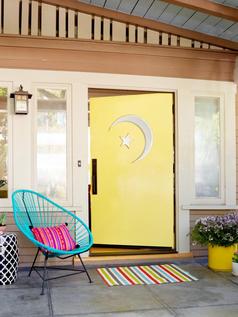 Yellow Front Door With Celestial Cutouts
