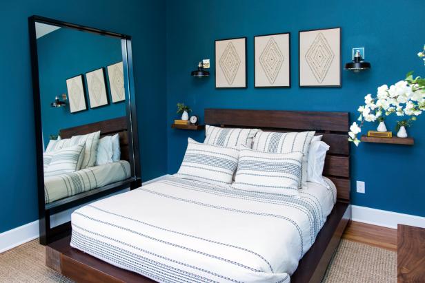 Bedroom with Blue Walls, Large Mirror and Platform Bed