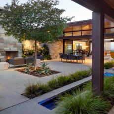 Contemporary Courtyard With Outdoor Fireplace 