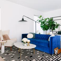 Eclectic Living Room With Blue Sofa