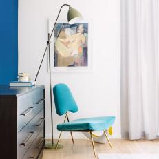 Eclectic Bedroom With Blue Chair